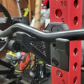 Bar Bunker EZ curl bar holder mounted on a rack